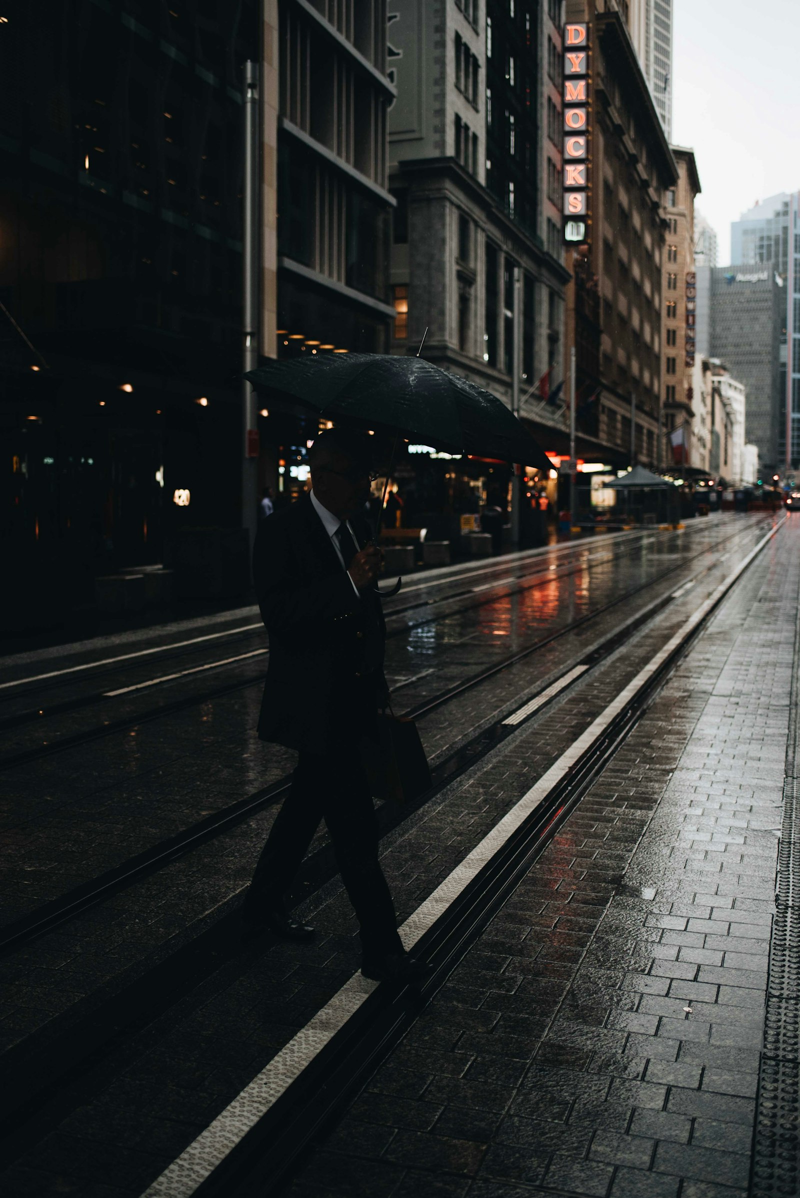 Nikon AF-S Nikkor 35mm F1.8G ED sample photo. Man walking on road photography