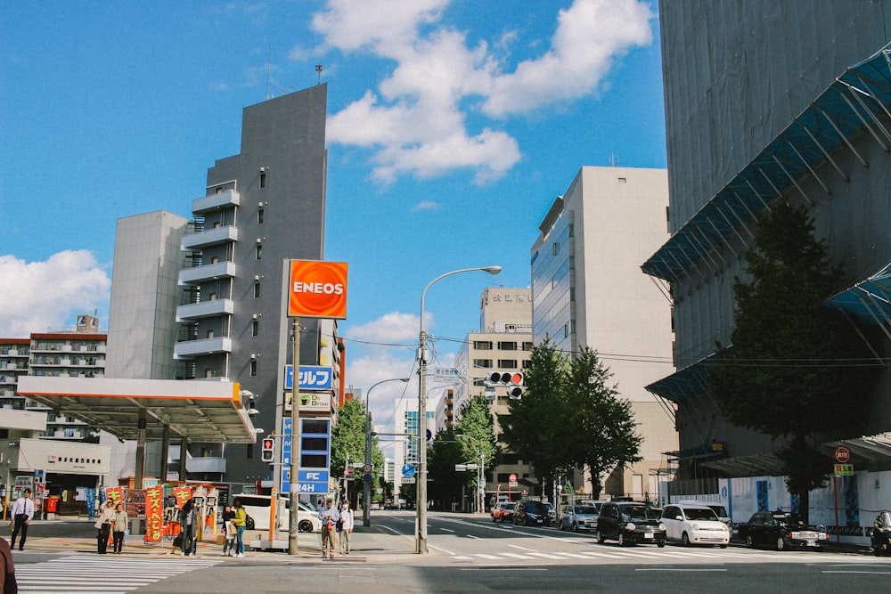 people walking crosswalk during daytime