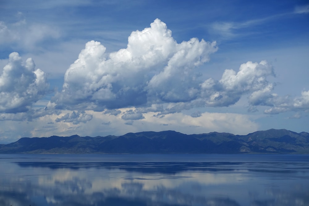 nimbus clouds and mountain photo