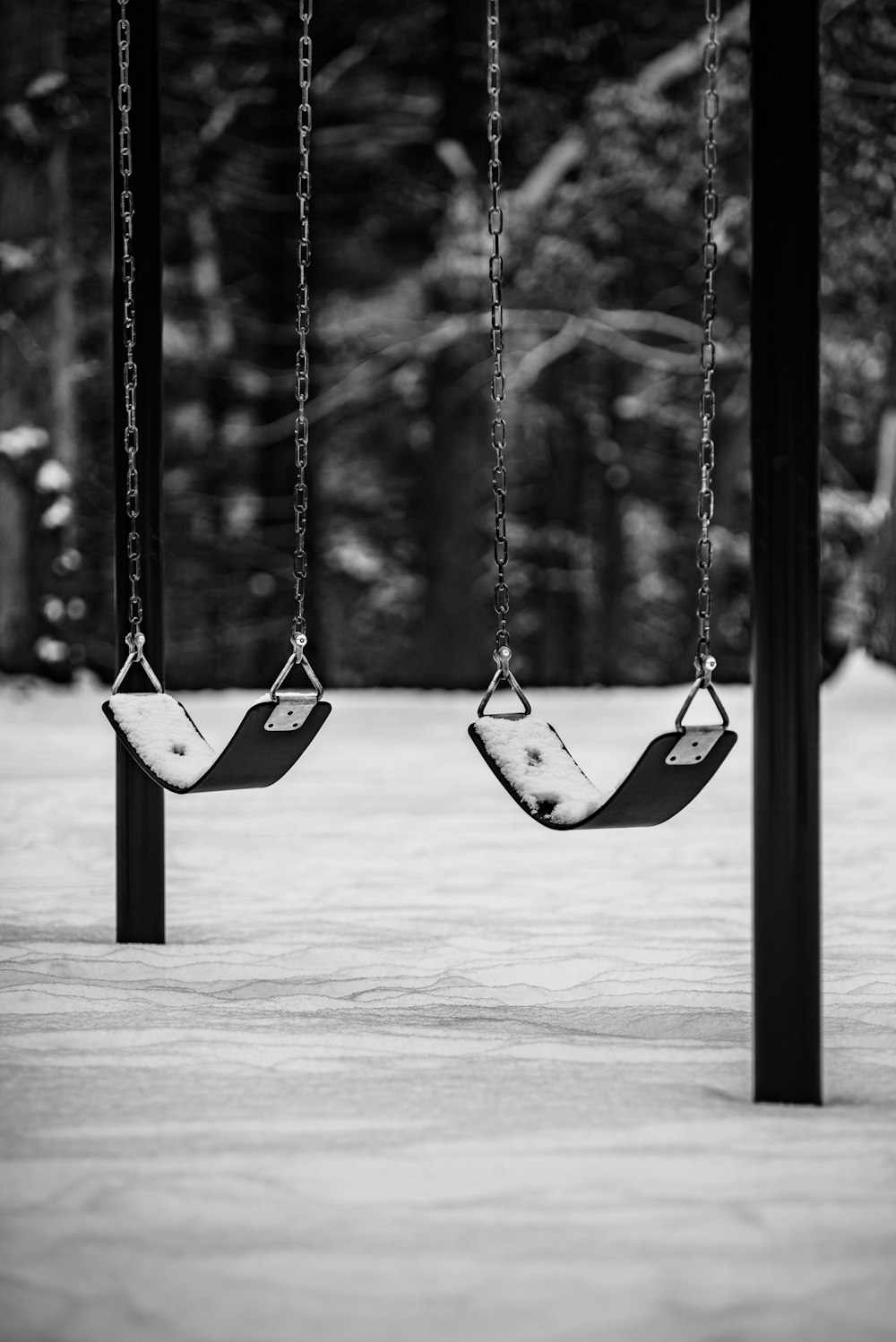 two swings with chain handles