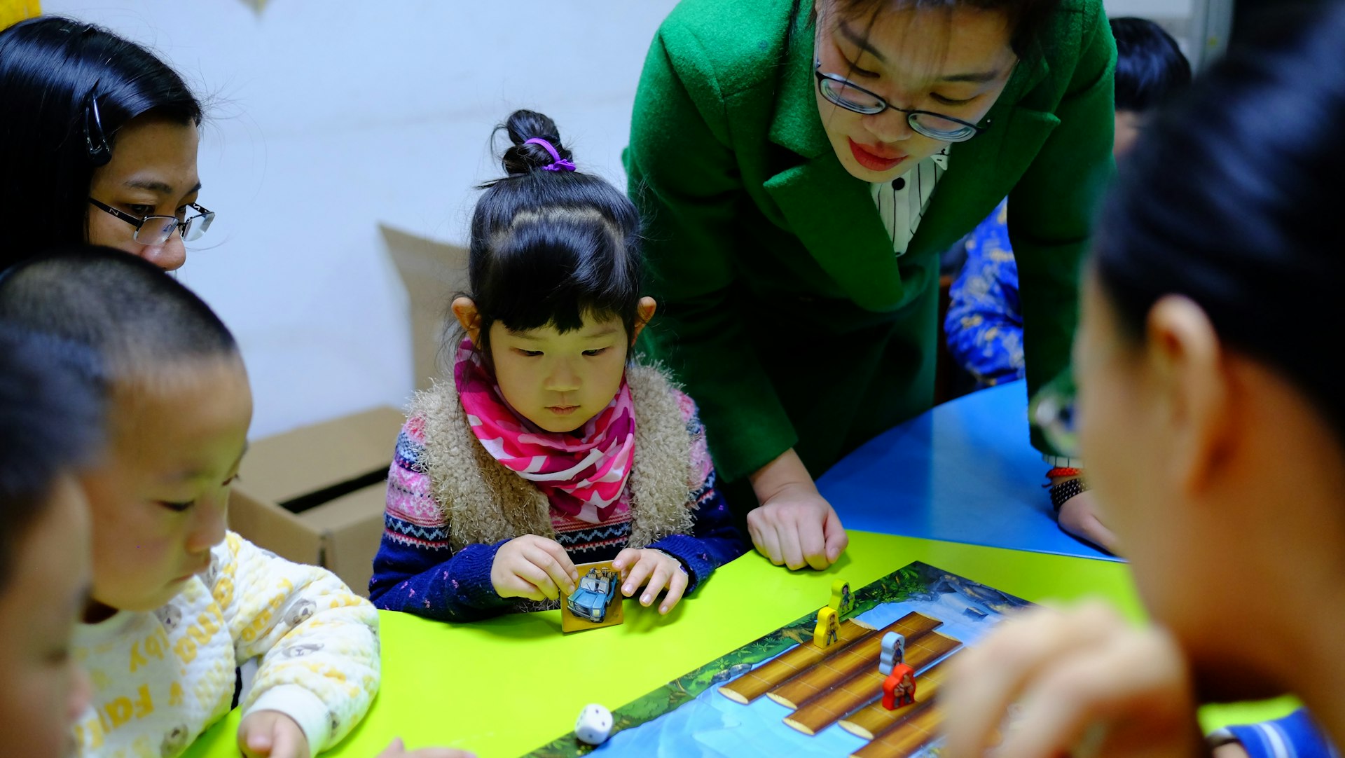 woman teaching children