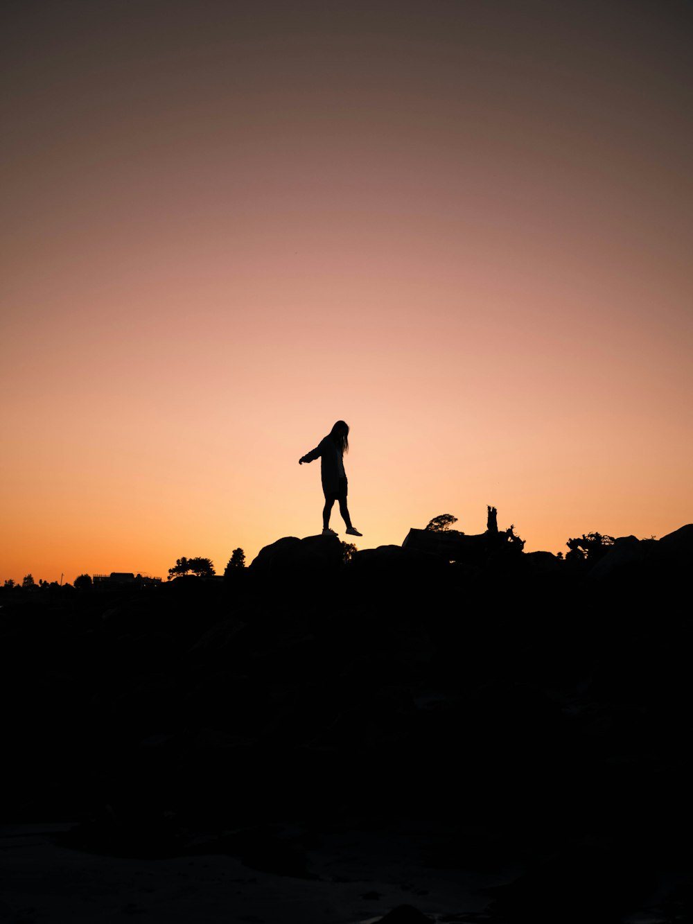 silhouette of girl during sunset