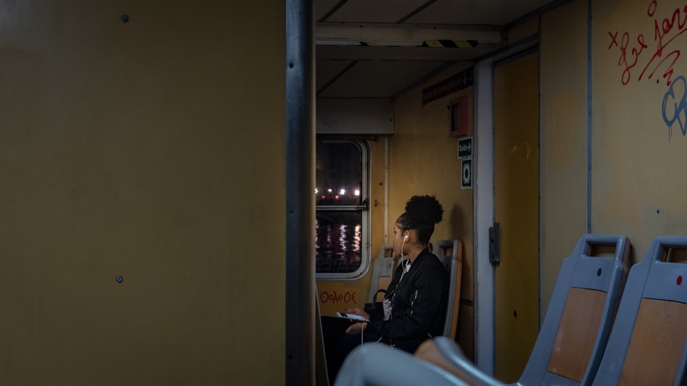 woman sitting inside room