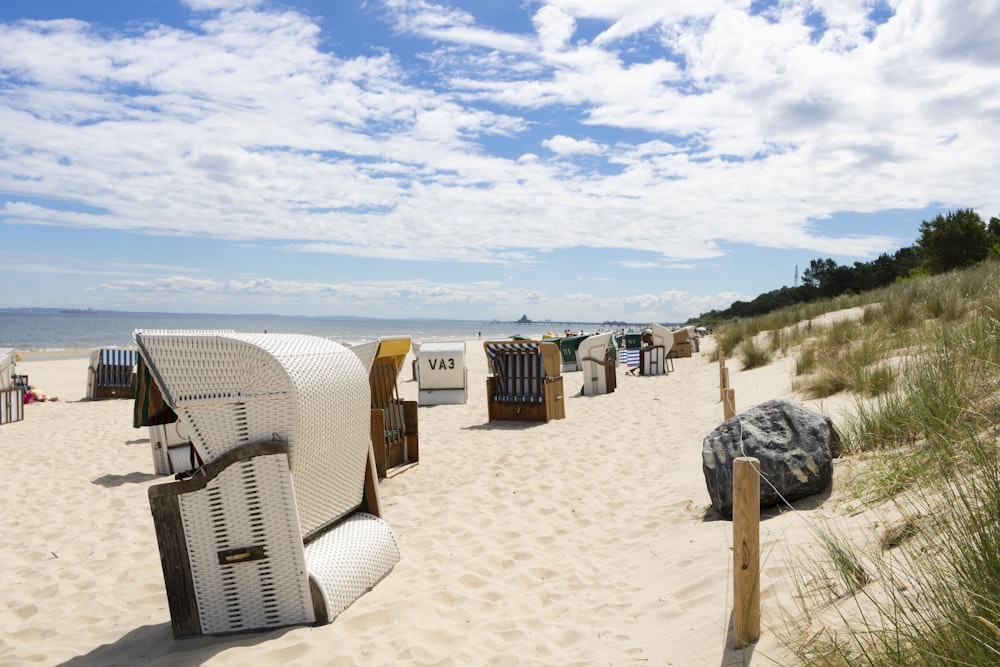 white and gray bench on seashore