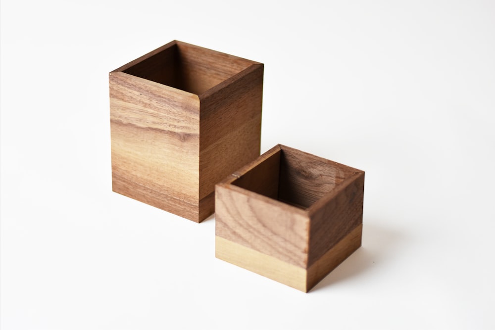 two brown wooden boxes