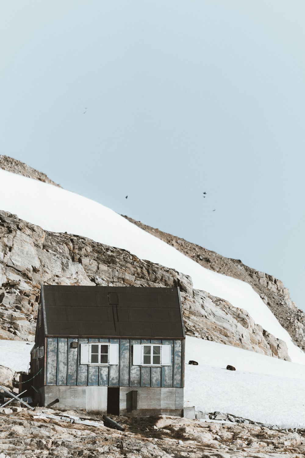 gray house under blue sky