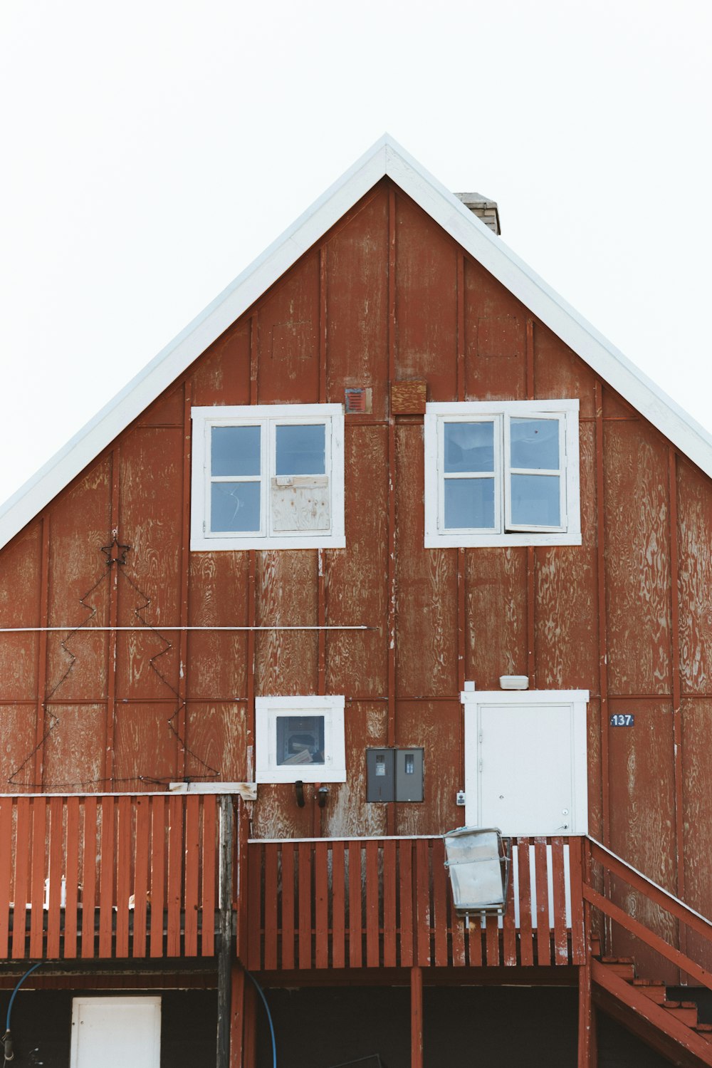 white and brown wooden house during daytime