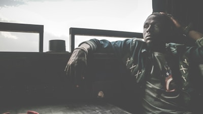 Illustration of a calm person reflecting on conflict triggers in a peaceful room.