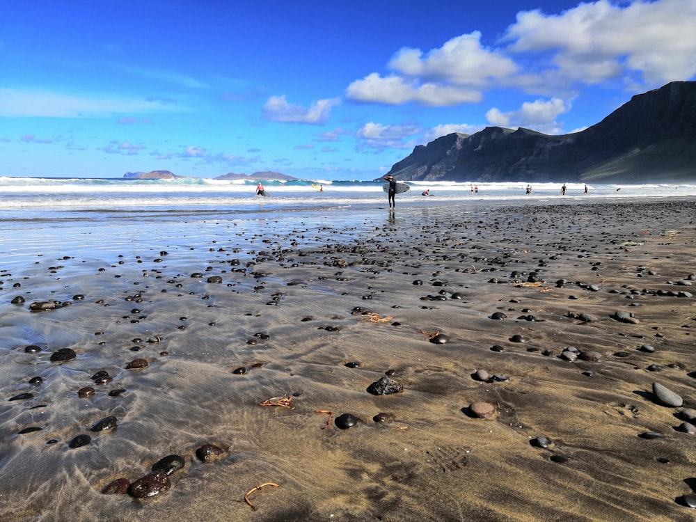 person standing on seashore