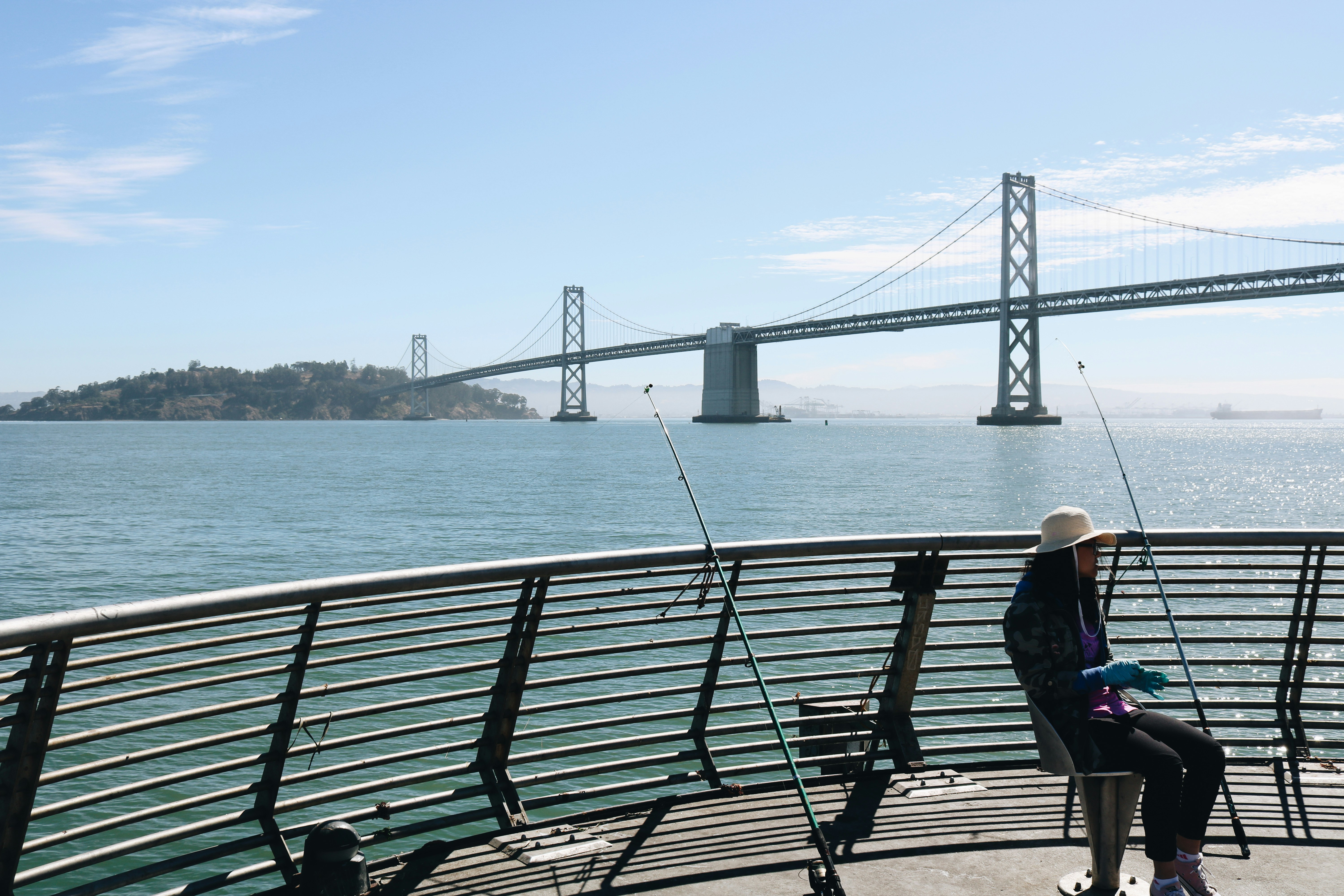 person sitting on bench during daytime