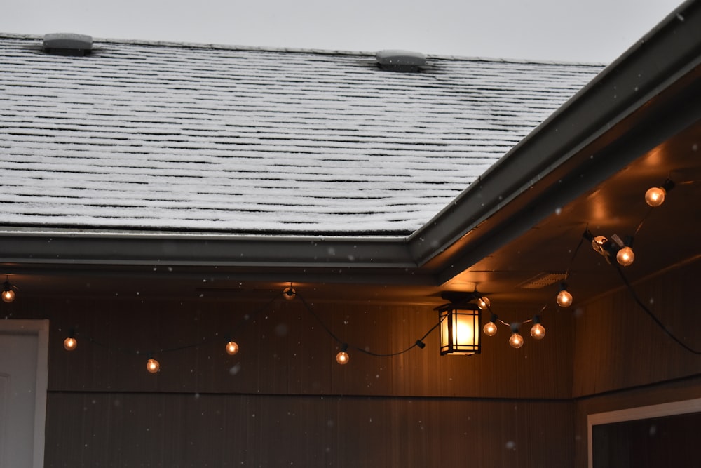 mini string lights and ceiling lamp turned on