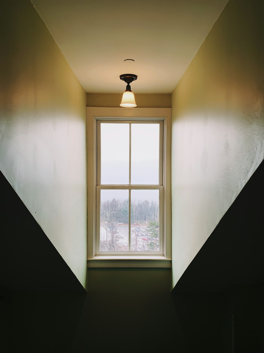 white wooden-framed clear glass window