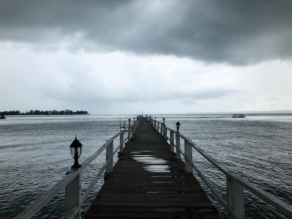 grayscale photo of sea dock