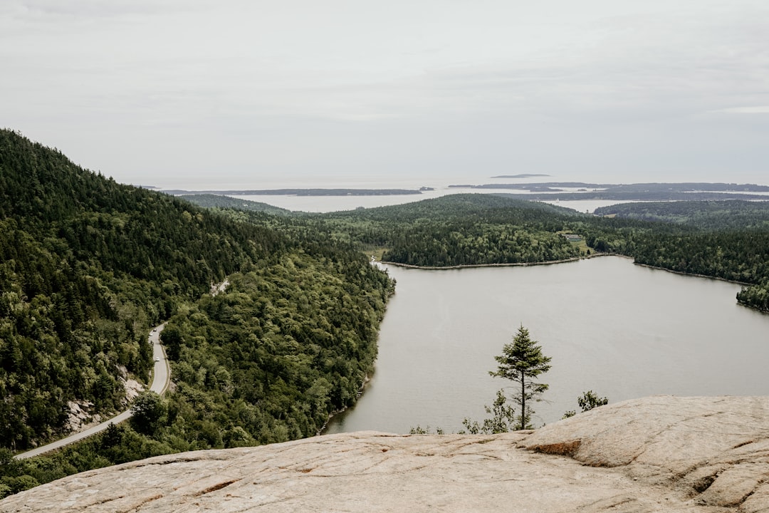 calm lake under grey clouds