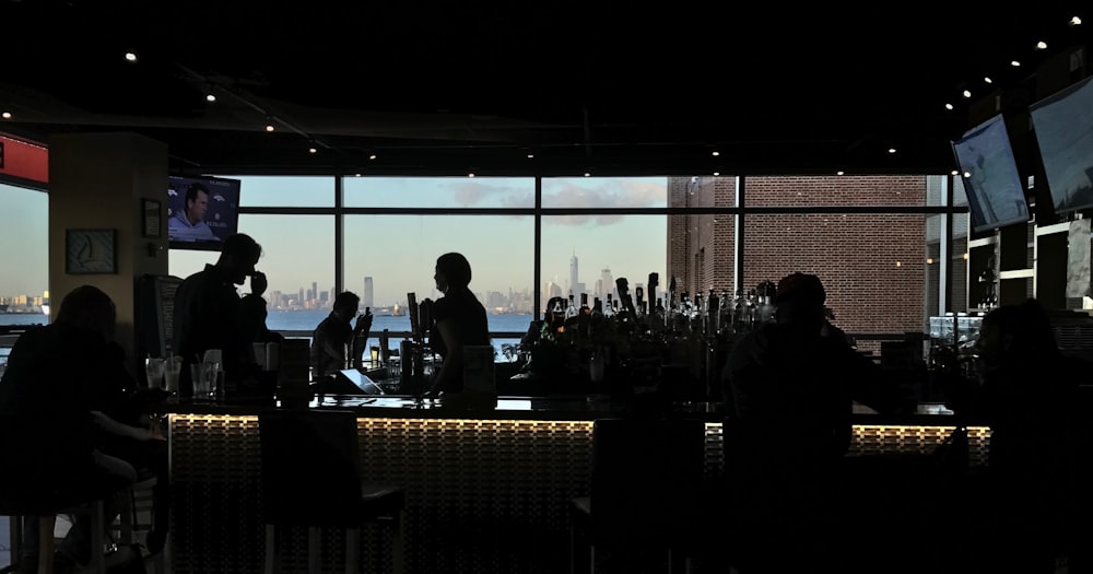 silhouette of people inside building