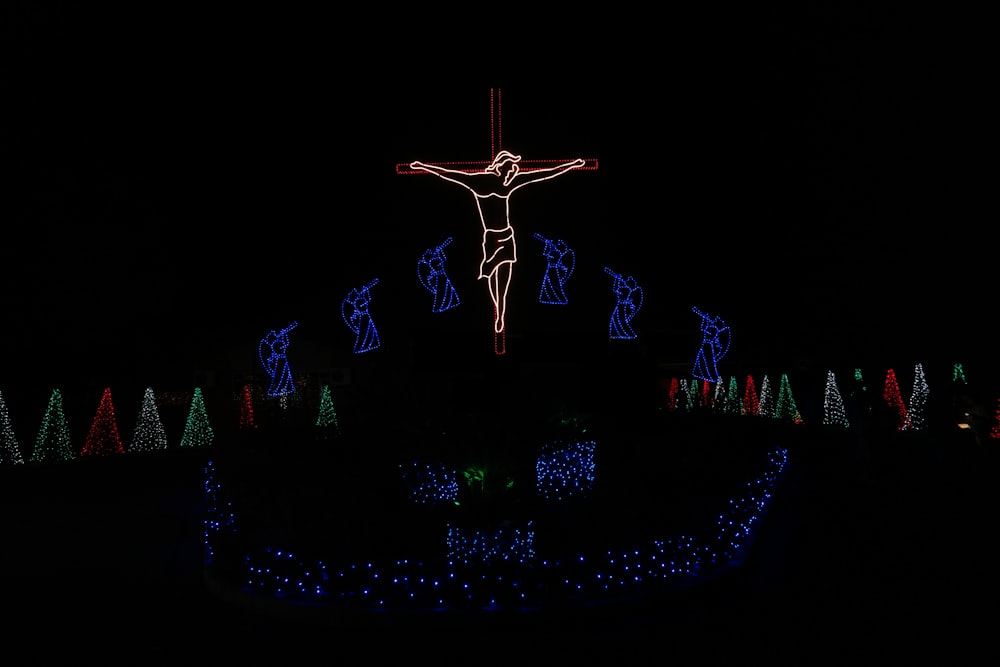 lighted Jesus Christ string light at night