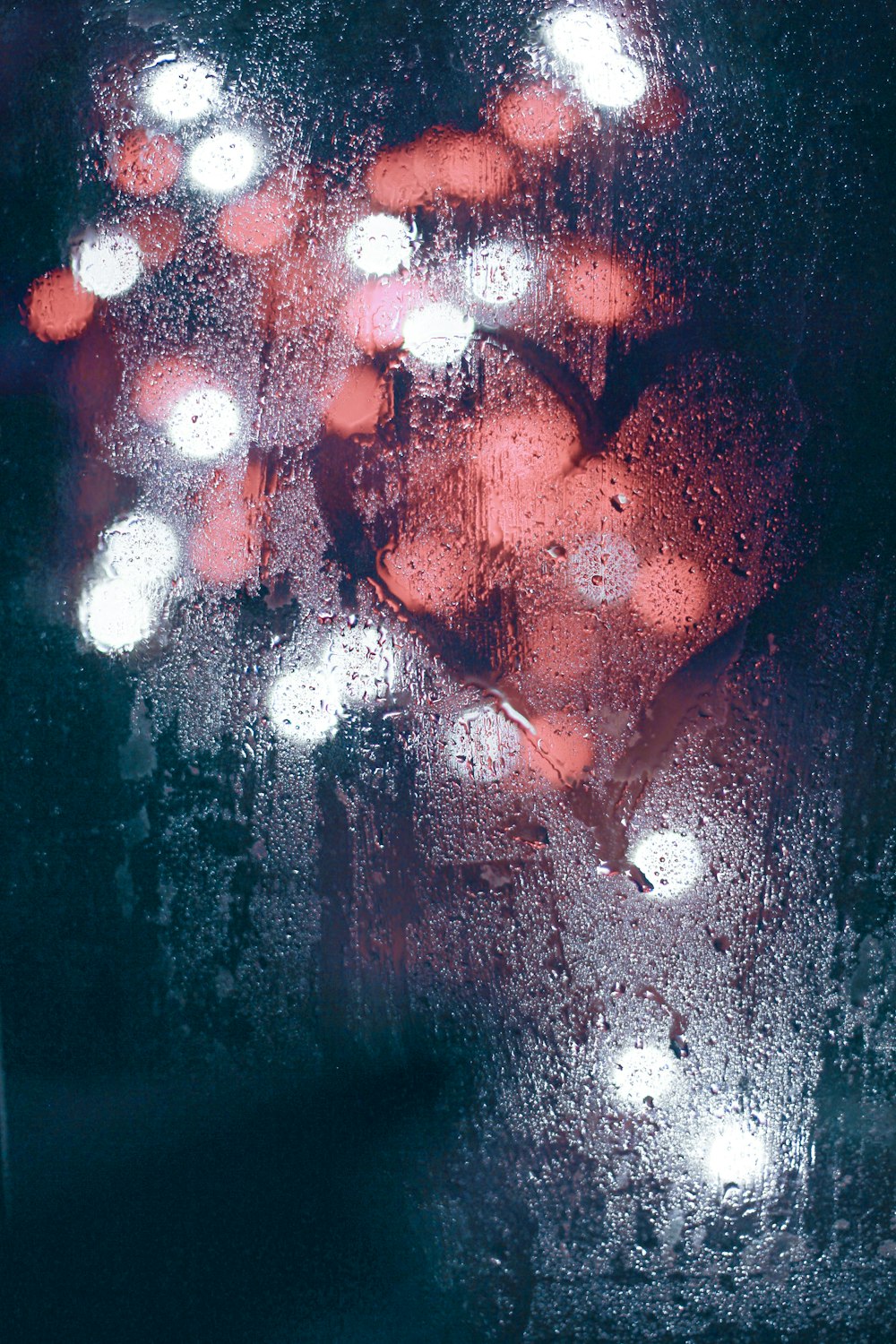 a close up of a window with a bunch of lights on it