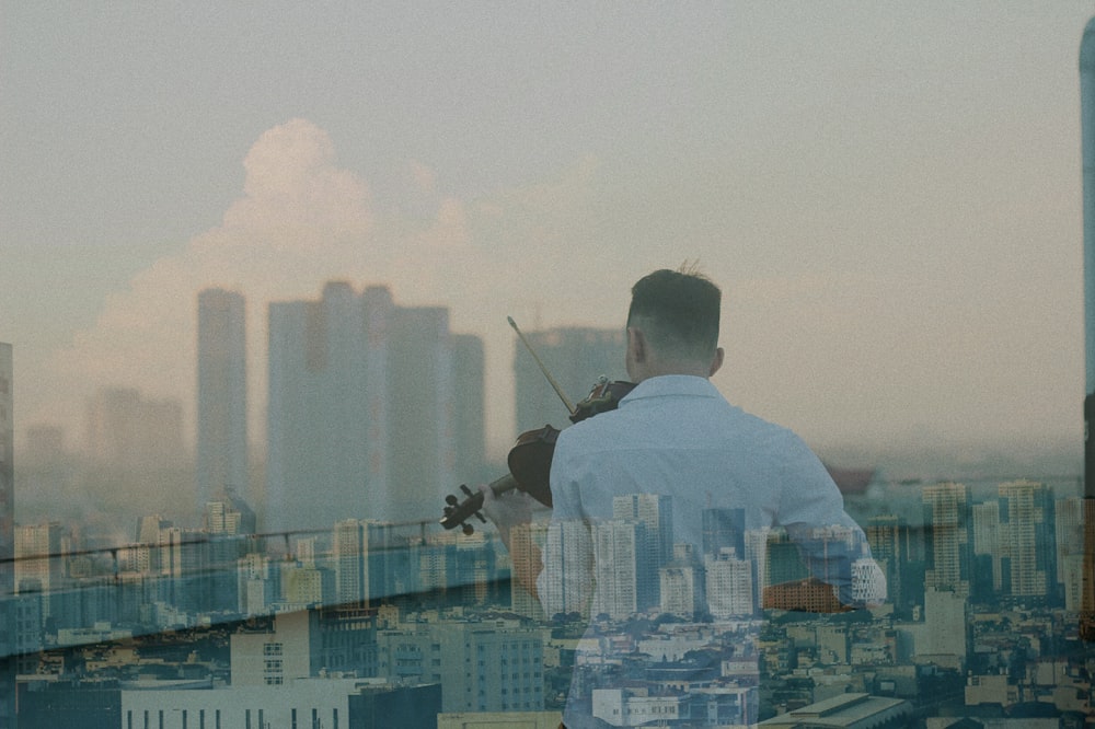 man holding violin