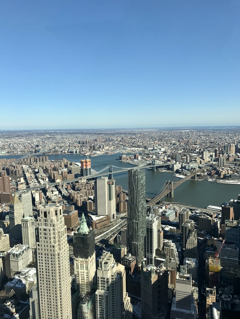 areal photography of brown and gray high-rise buildings