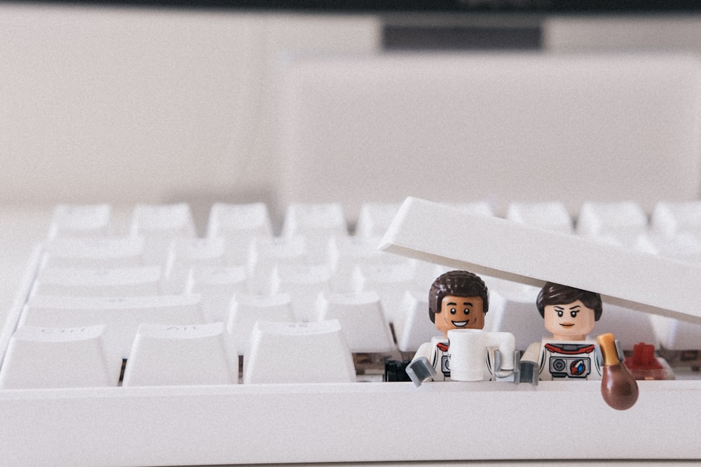 white computer keyboard on white surface