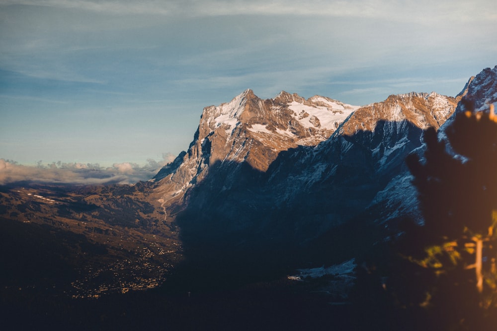 mountain covered by snow at daytime