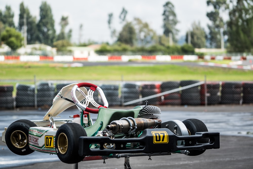 green and black racing car