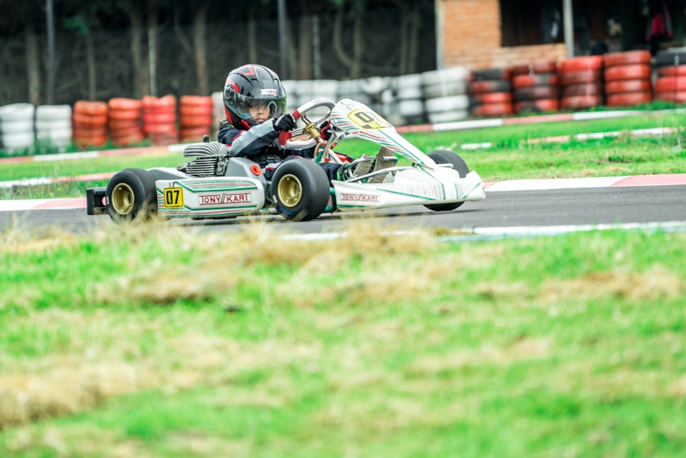 man riding on go-kart