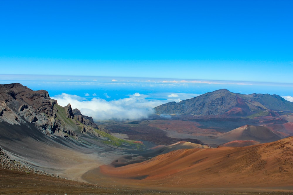 view of mountain under blue sky