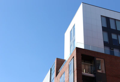 Corporate building exterior in Scarborough with clear blue sky background.
