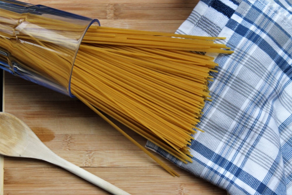 brown noodle sticks on brown surface