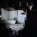 A dilapidated bathroom with broken walls and debris scattered on the floor. The room has white tiles, some of which are damaged, and an old bathtub. The lighting is dim, casting shadows and creating a somber atmosphere.