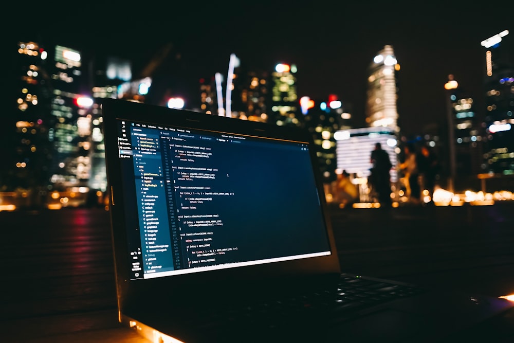 black laptop computer displaying blue screen