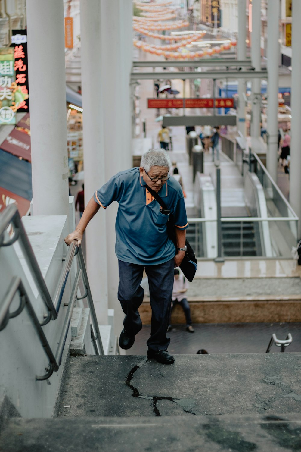 man wearing blue polo shirt