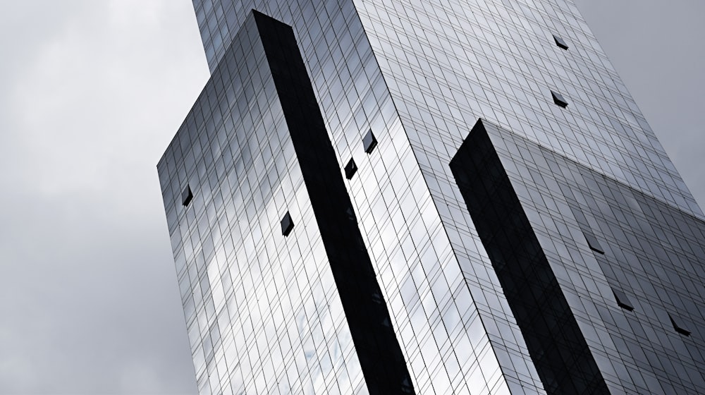 curtain wall high rise building during daytime