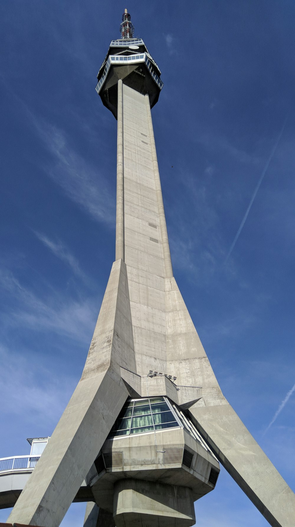 gray concrete tower low angle photography