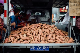 A friendly customer service representative ready to assist with sweet potato export questions.