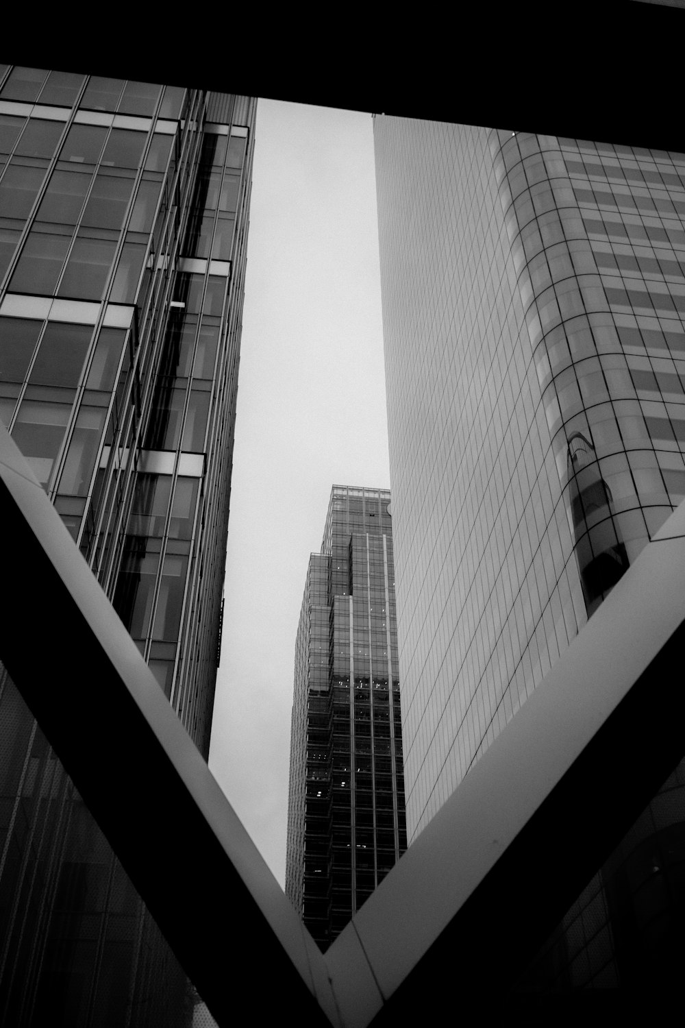 low angle photography of curtain buildings
