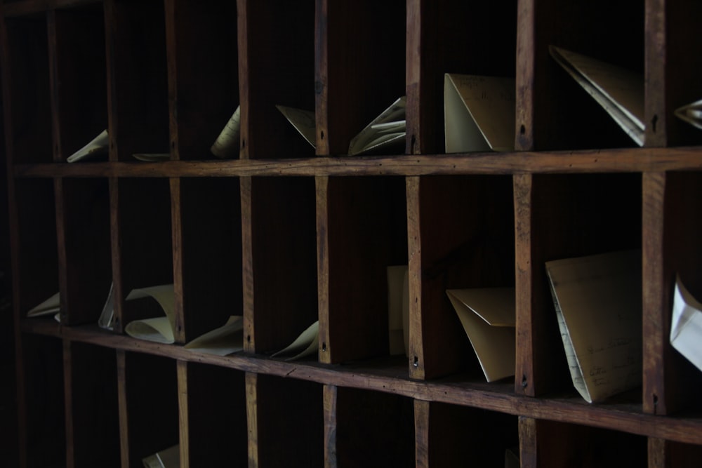 brown wooden mail rack