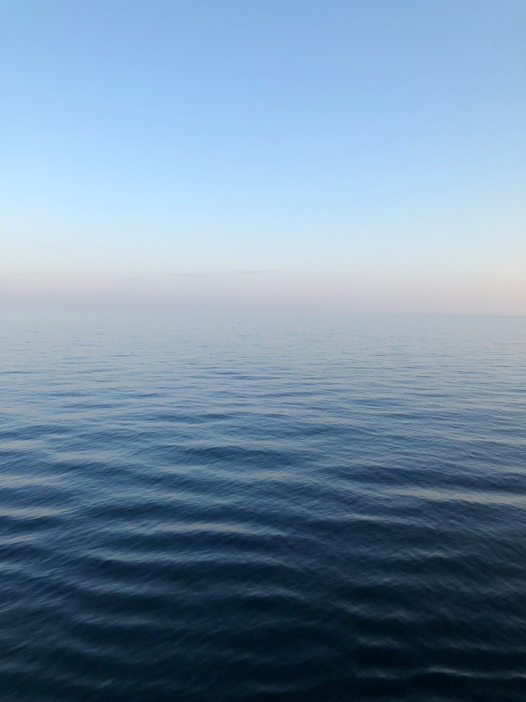 calm body of water during daytime