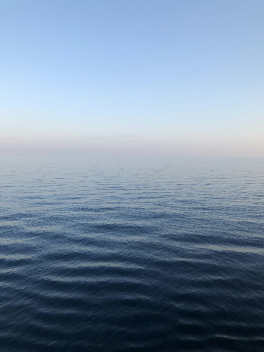 calm body of water during daytime