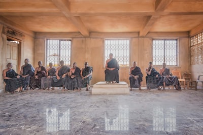 group of people sitting inside building ghana zoom background