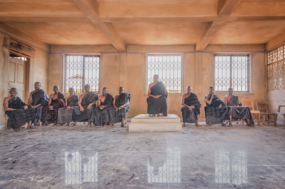 group of people sitting inside building