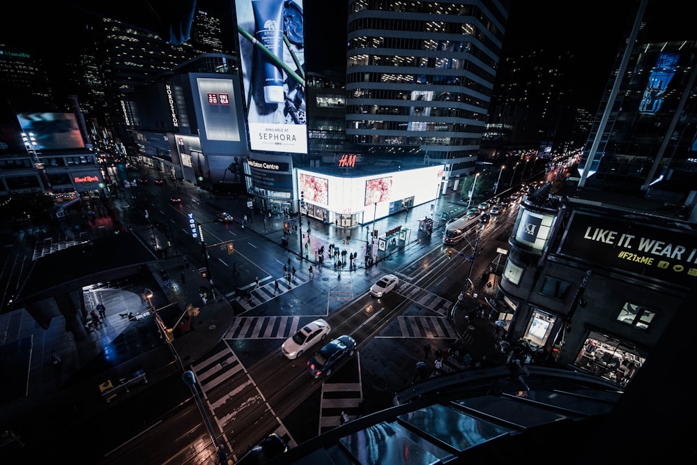 city and vehicle during nighttime