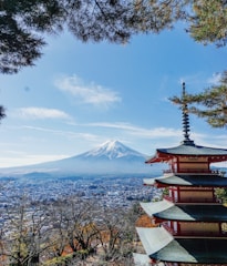 A vibrant photo of iconic Japanese landmarks like Mount Fuji and cherry blossoms.