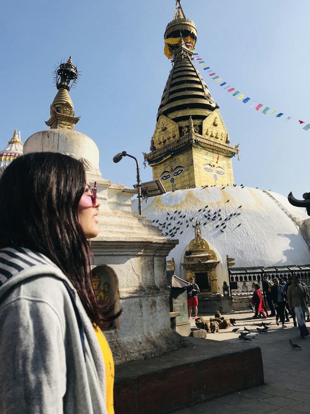 woman standing near statue