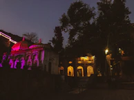 Evening lights illuminating the holy sites, creating a calm atmosphere.