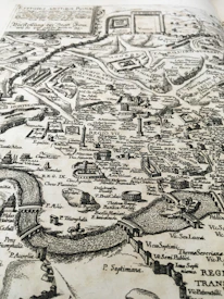 Close-up of a finely detailed, aged map showing strategic fortifications and trade routes in Ebonyr.