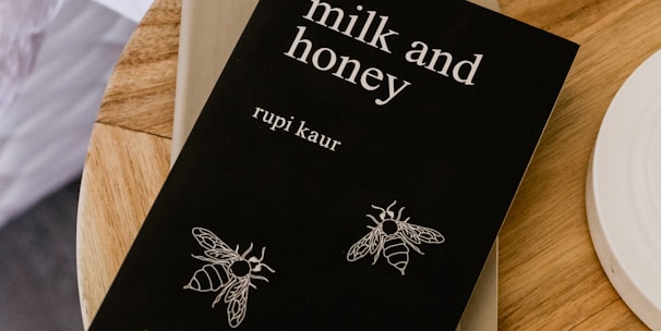 Milk and Honey by Rupi Kaur book on side table