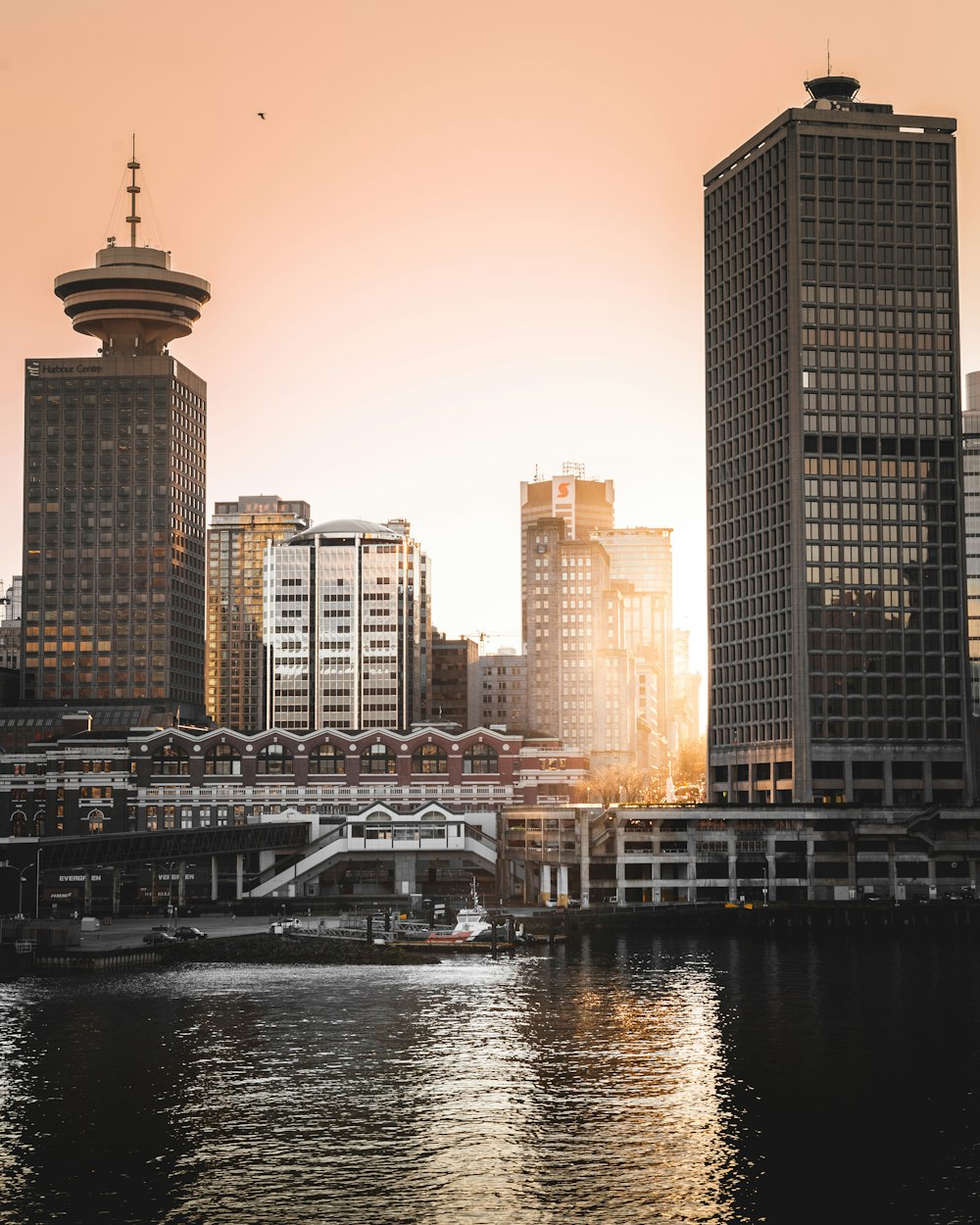 curtain wall high rise building during sunset