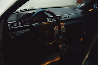 black vehicle steering wheel